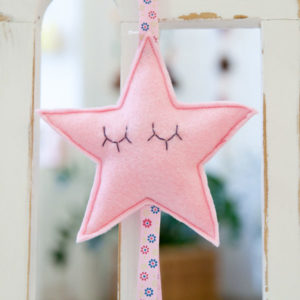 Kinderwagenanhänger Stern rosa